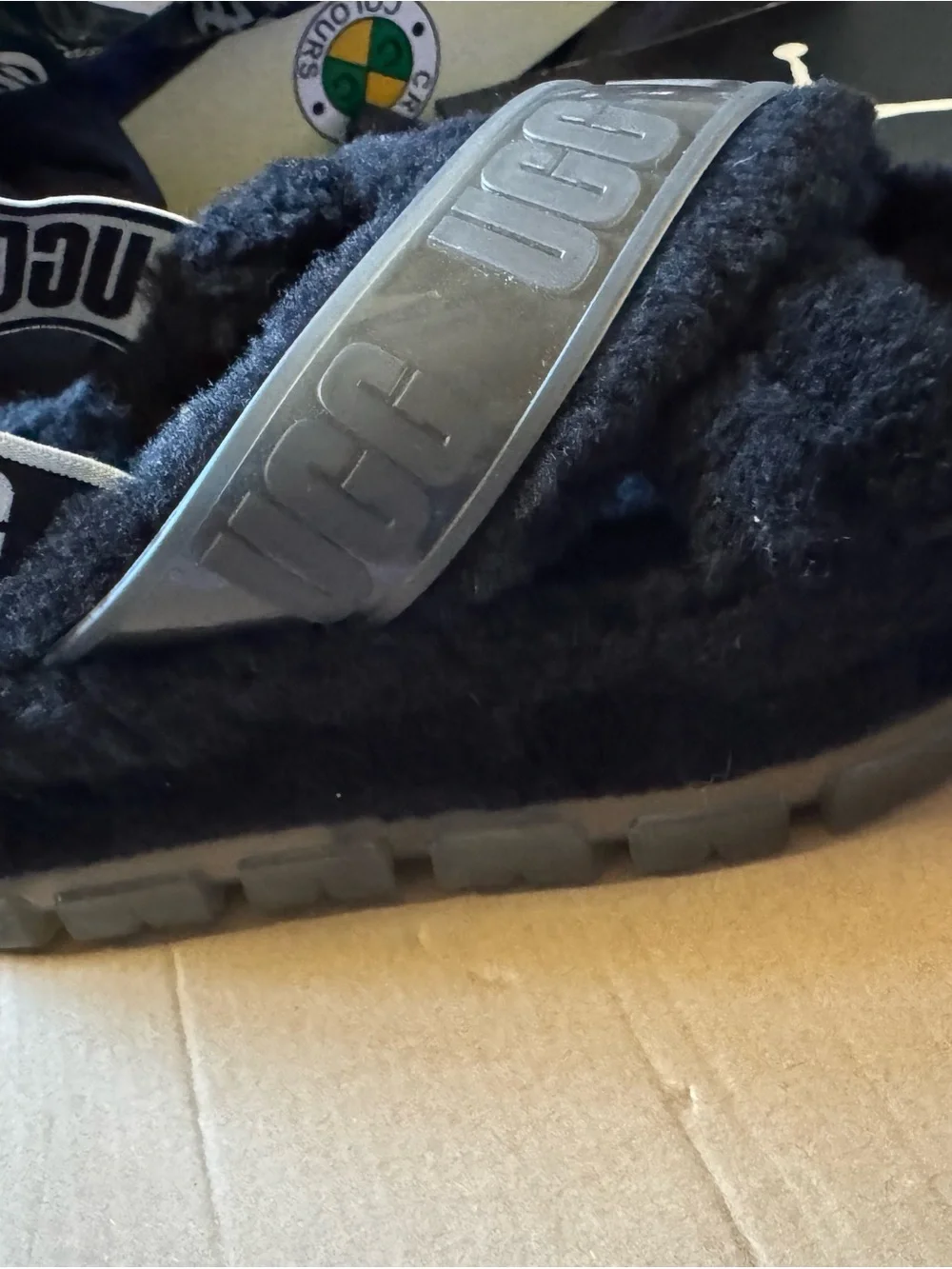 UGG woman’s Black Fuzz Platform Slide